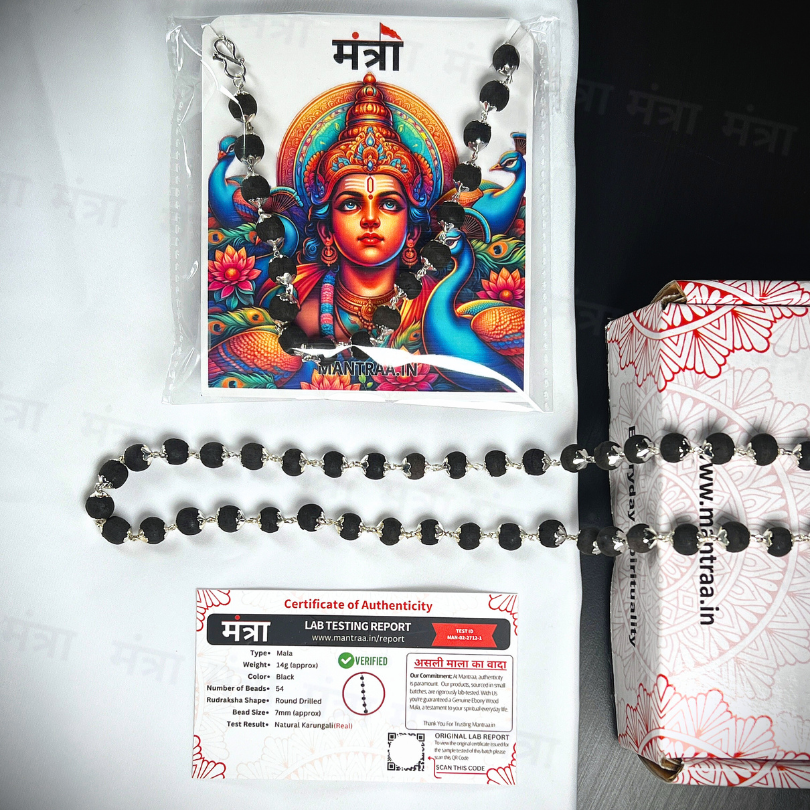 Black beaded necklace with colorful packaging featuring a deity, certificate of authenticity, and lab testing report on a white background.