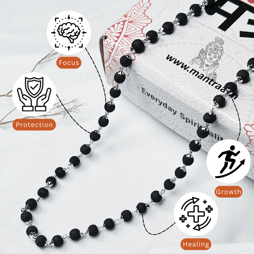 Black beaded necklace with motivational icons and text on a white background