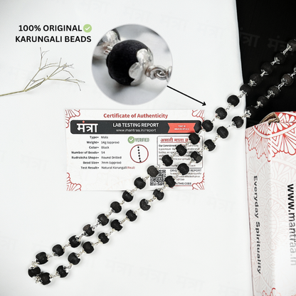 Black beaded necklace with packaging and certification on a white background